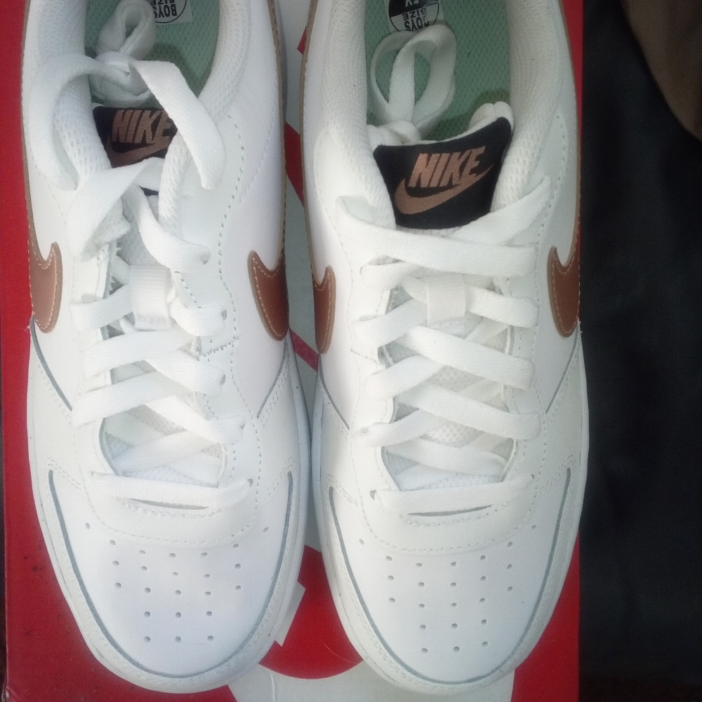 Nike White Sneakers with Copper Swoosh and Black Tongue Label